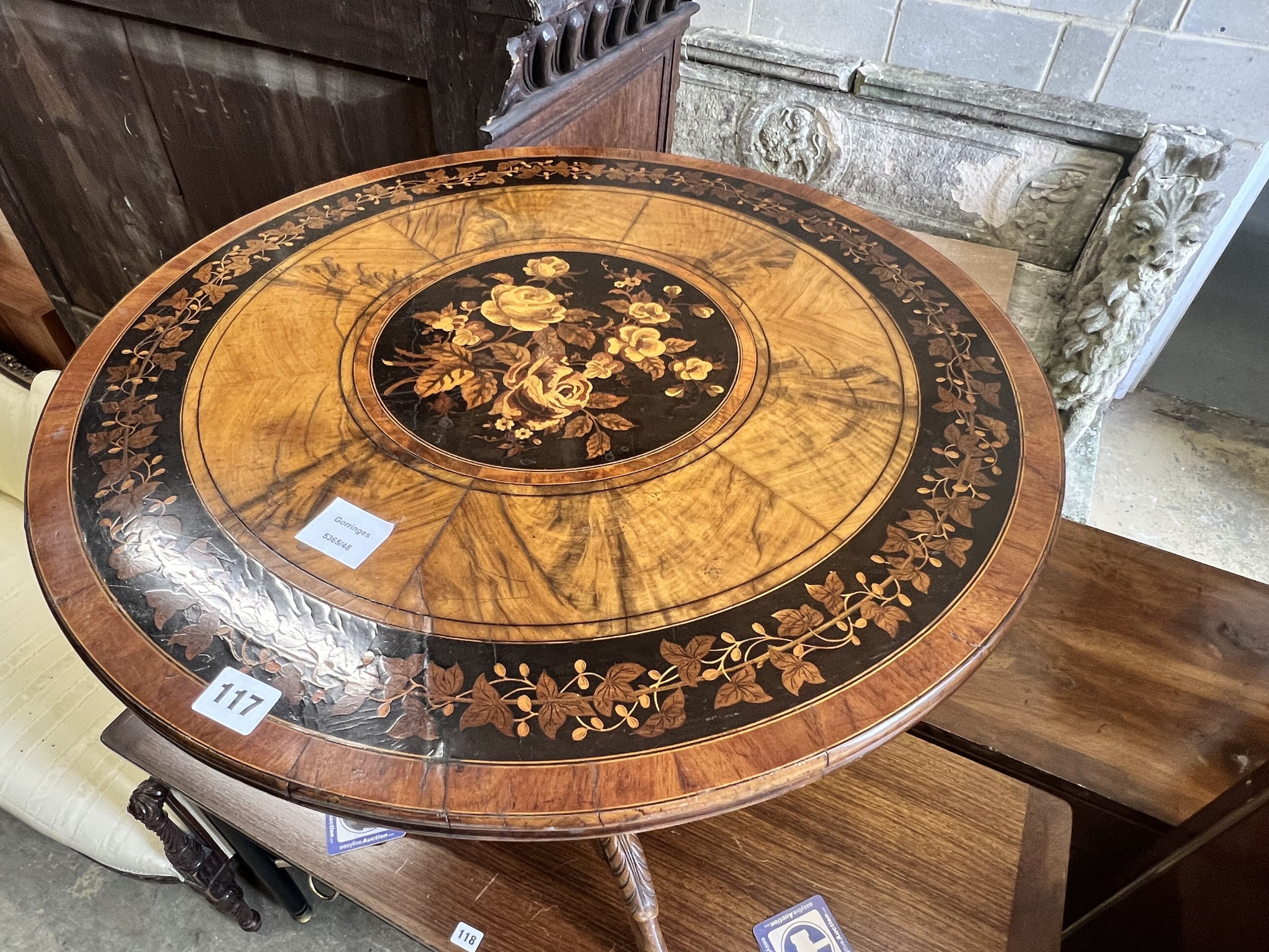 A Victorian floral marquetry inlaid circular walnut tripod table, diameter 62cm height 69cm